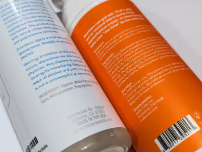 Photo of ingredients labels on two different lubes