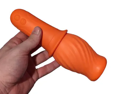 Cake Spin Stroker in a hand