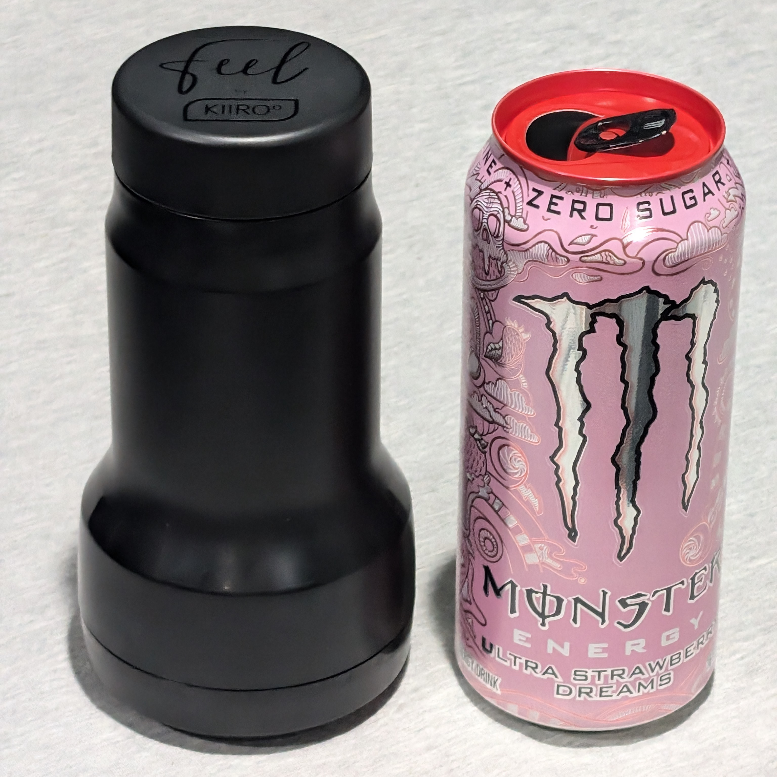 Pocket stroker size compared to a can of energy drink